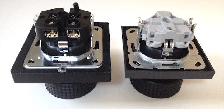 Unterschiede in vielen Details: Die C-Lock SE (links) setzt auf Furutech auf, die C-Lock Lite (rechts) auf Gira